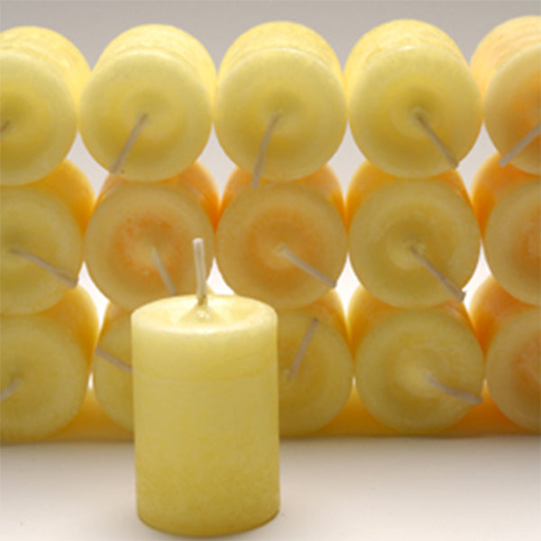Coventry Creations Blessed Herbal Happiness Power Votive Yellow candles stacked with one candle in front