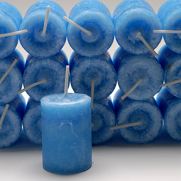 Coventry Creations Blessed Herbal Inner Balance Power Votive Light Blue candles stacked with one candle in front